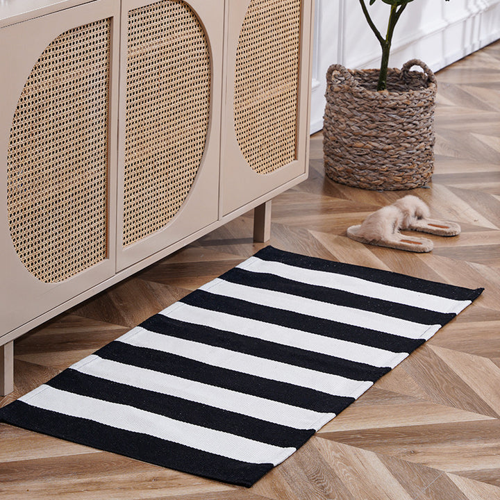 Flat-woven runner rug with check pattern and decorative border stripe