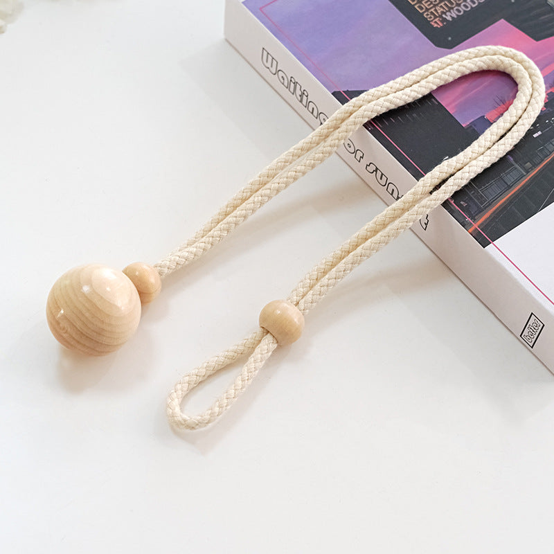 Elegant curtain holder with wooden beads