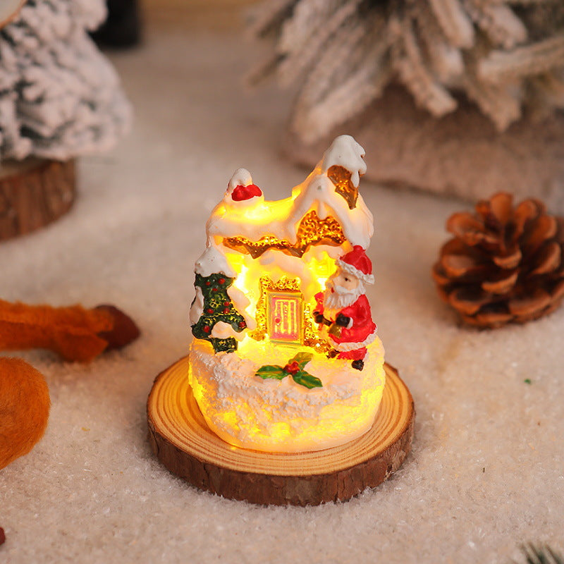 Christmas miniature lighting with snow scenes