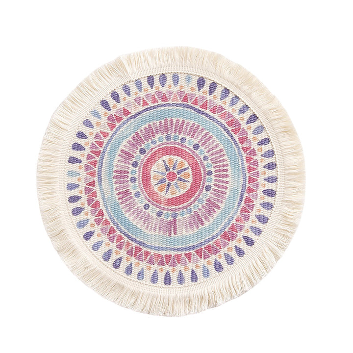 Round flat-woven cotton rug with mandala design and decorative fringes