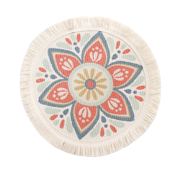 Round flat-woven cotton rug with mandala design and decorative fringes