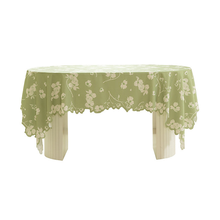 Round wipeable tablecloth with floral cut-out hem