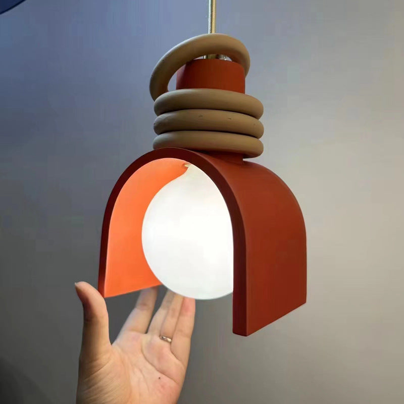 Scandinavian Arch-Shade pendant lamp with wood ring accents and frosted globe