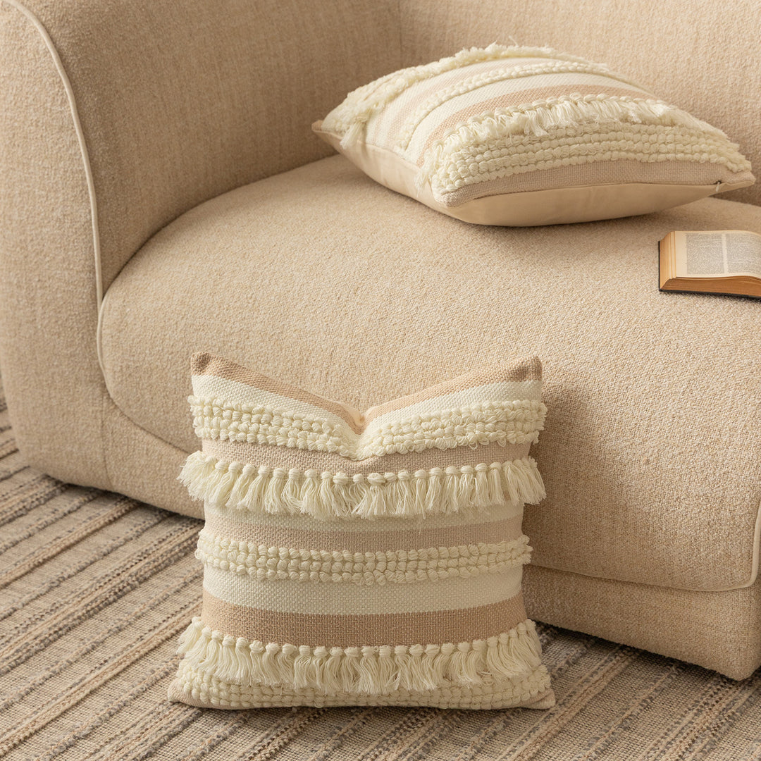Handwoven Boho decorative pillow with tiered fringe stripes and boucle appliqués
