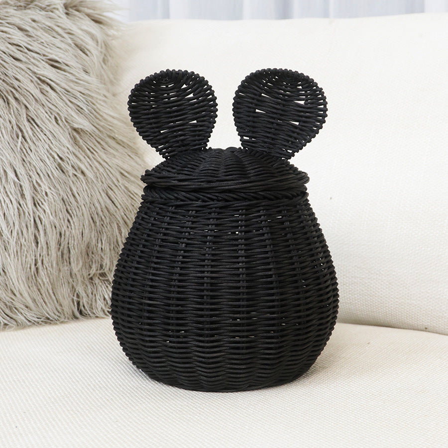 Playful storage basket with lid and ear design