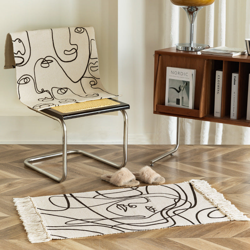 Woven cotton tabletop set with abstract line art