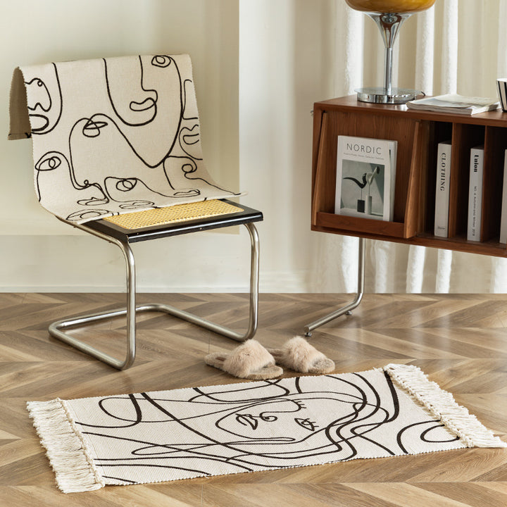 Woven cotton tabletop set with abstract line art