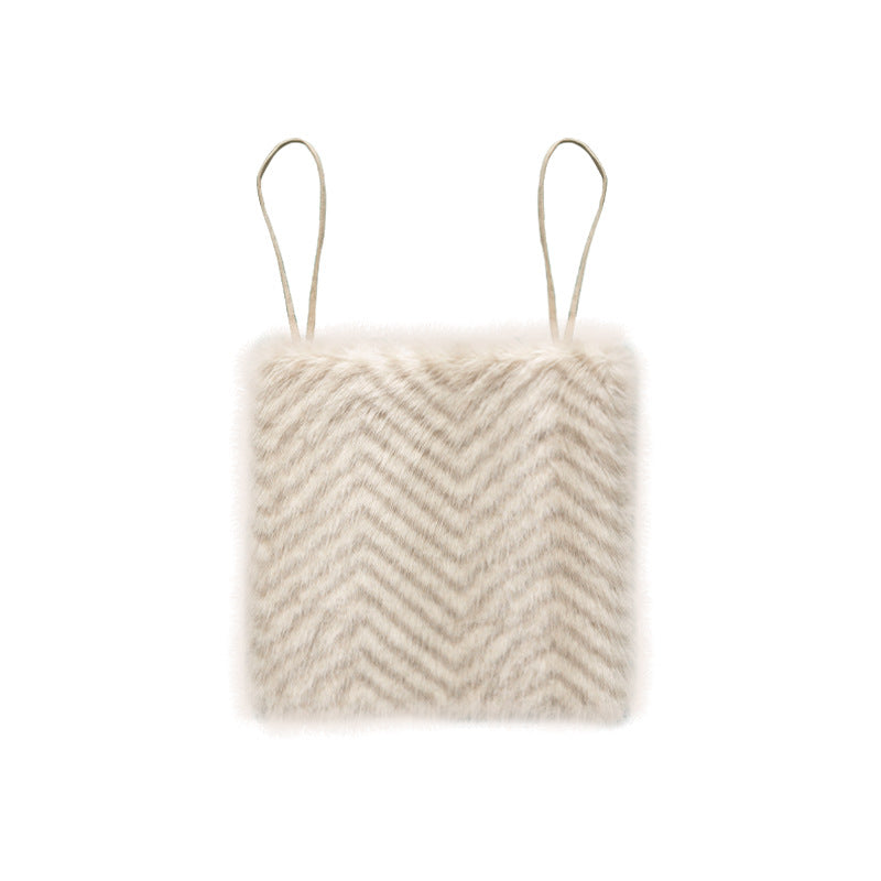 Square chair cushion made of cozy artificial fur with non-slip base and strap attachment