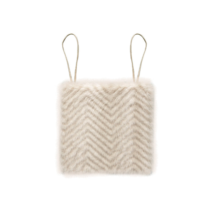 Square chair cushion made of cozy artificial fur with non-slip base and strap attachment