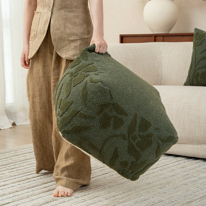 square pouf with bouclé cover and textured jacquard pattern
