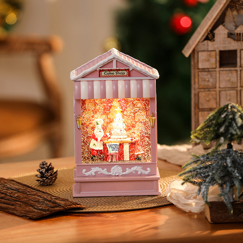 Illuminated Christmas lantern with snow and Christmas motif