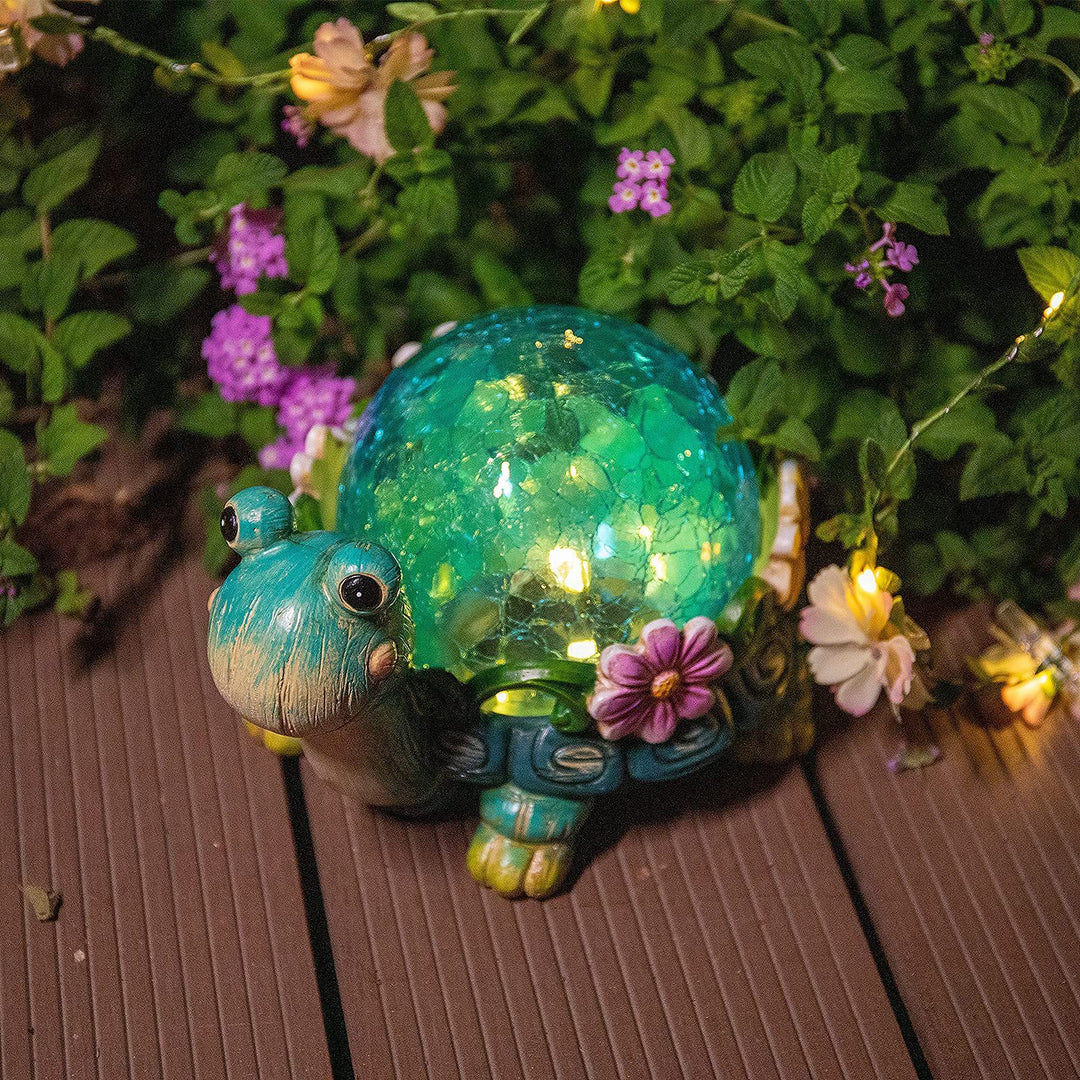 Solar-powered garden gnome sculpture with integrated LED fairy lights and turtle pot
