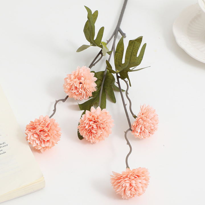 Artificial flower branch with intricate flowers