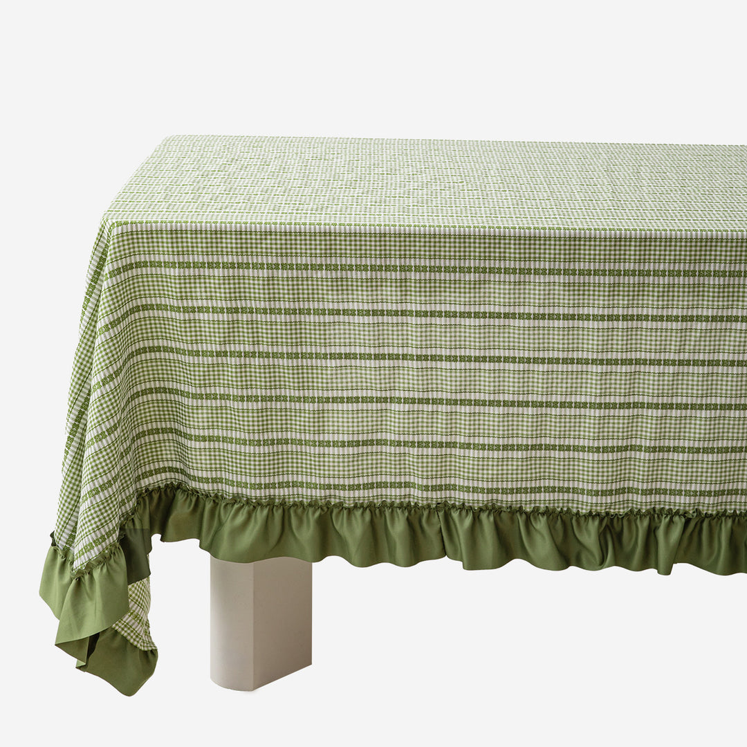 Rustic country house tablecloth made of cotton blend fabric with fine check pattern and ruffled hem