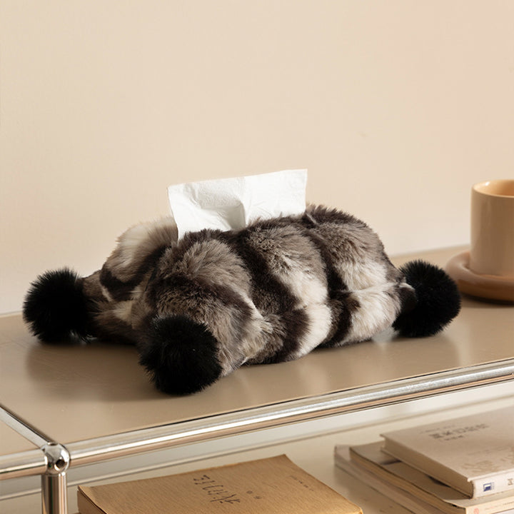 Cozy tissue box cover made of artificial fur with pom-pom application