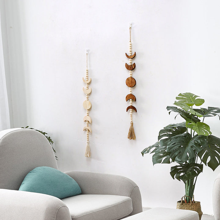 Decorative wall hanging with geometric wooden shapes
