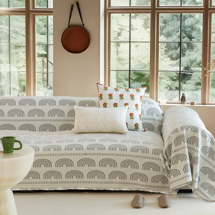 Woven sofa throw made of cotton blend with geometric pattern