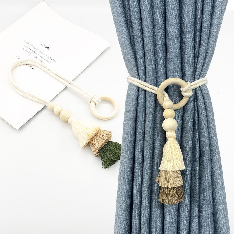 Decorative curtain holder with tassels