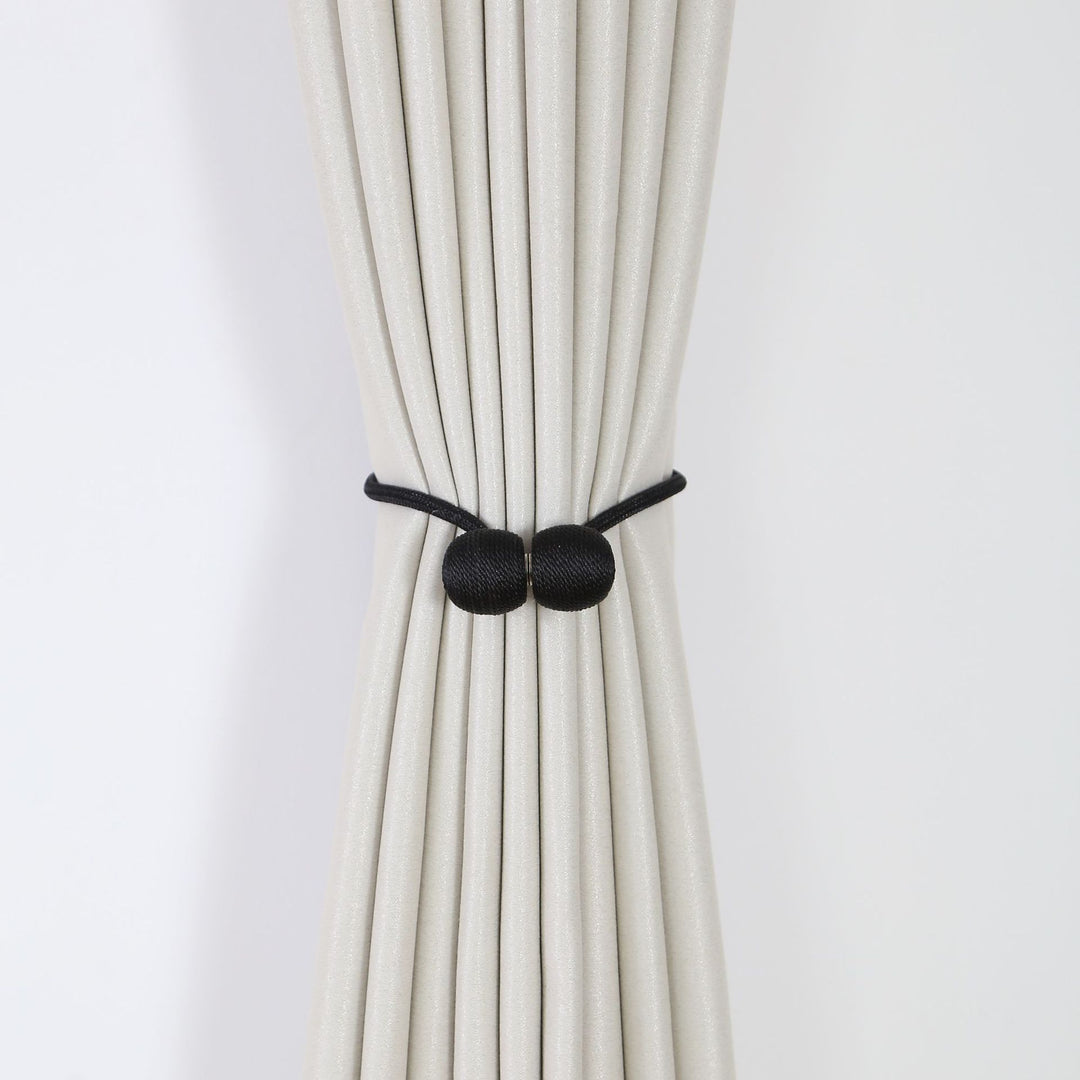 Decorative curtain tieback