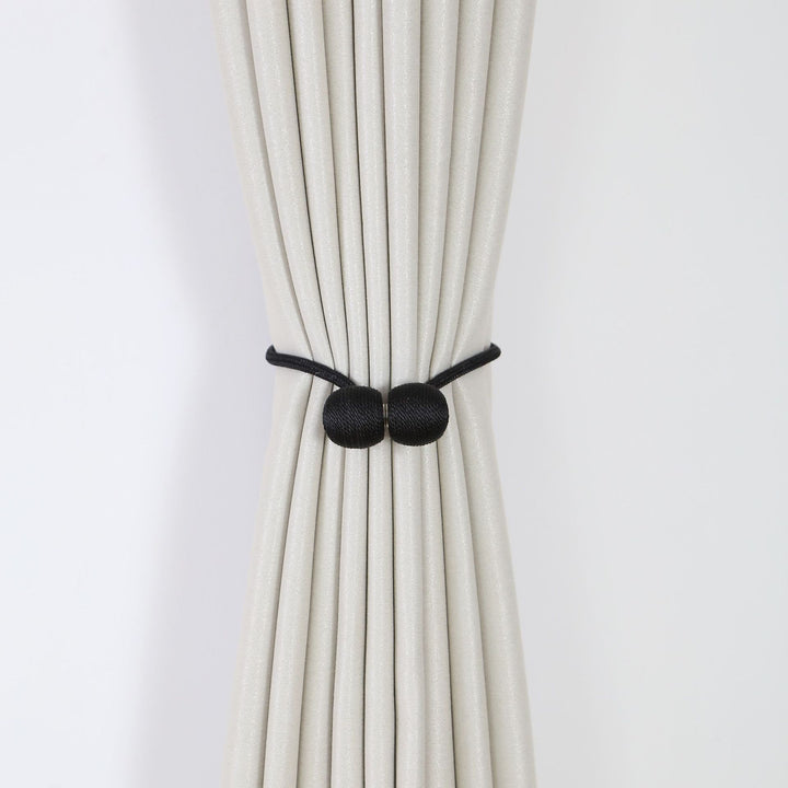 Decorative curtain tieback