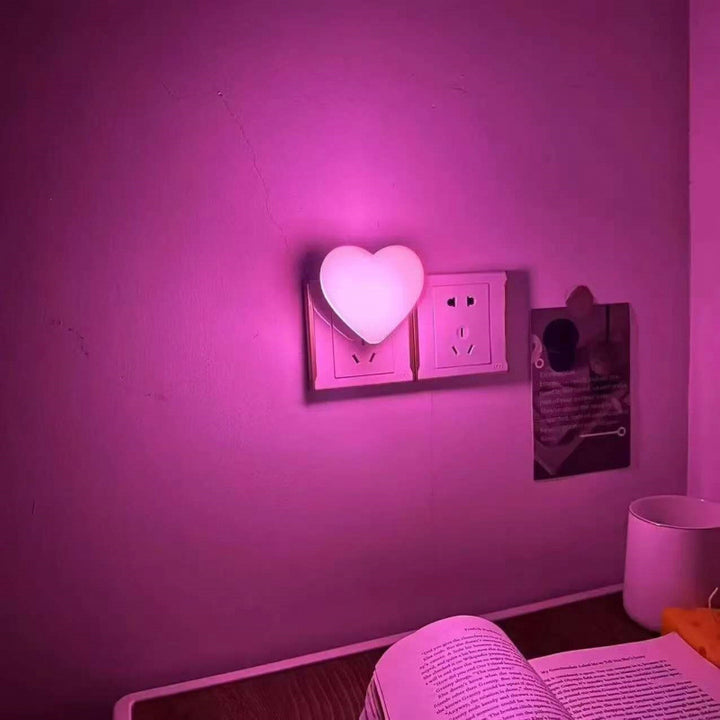 Heart-shaped plug-in ambient night light with soft LED lighting