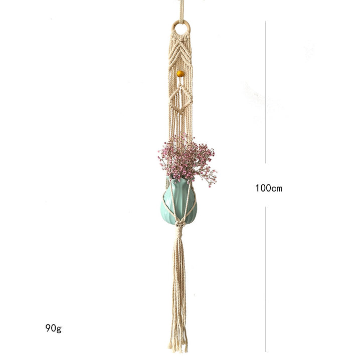 Macrame plant hanger with decorative tassels