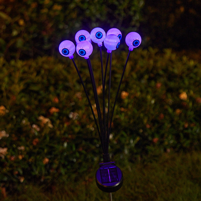 Creepy garden lights with eye motif