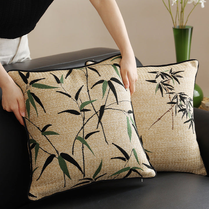 Woven decorative cushion cover with bamboo leaf jacquard and contrast piping