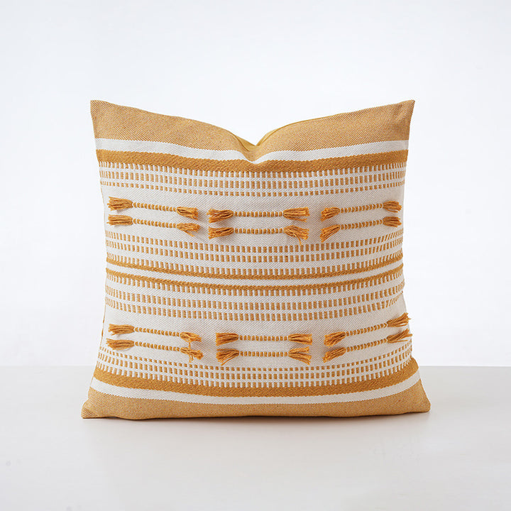 Structured square decorative pillow with crocheted trim and striped knit texture