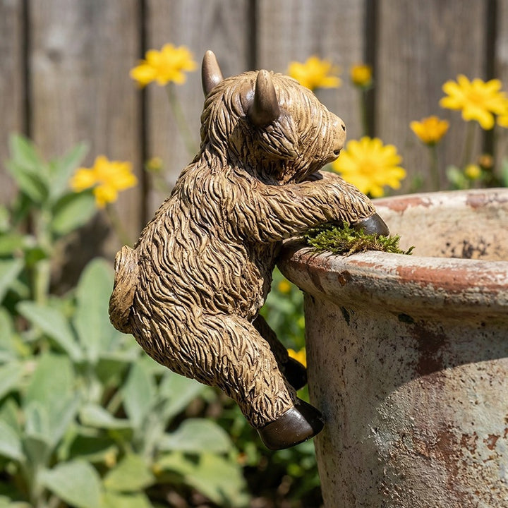 Playful Highland Cow Figurine