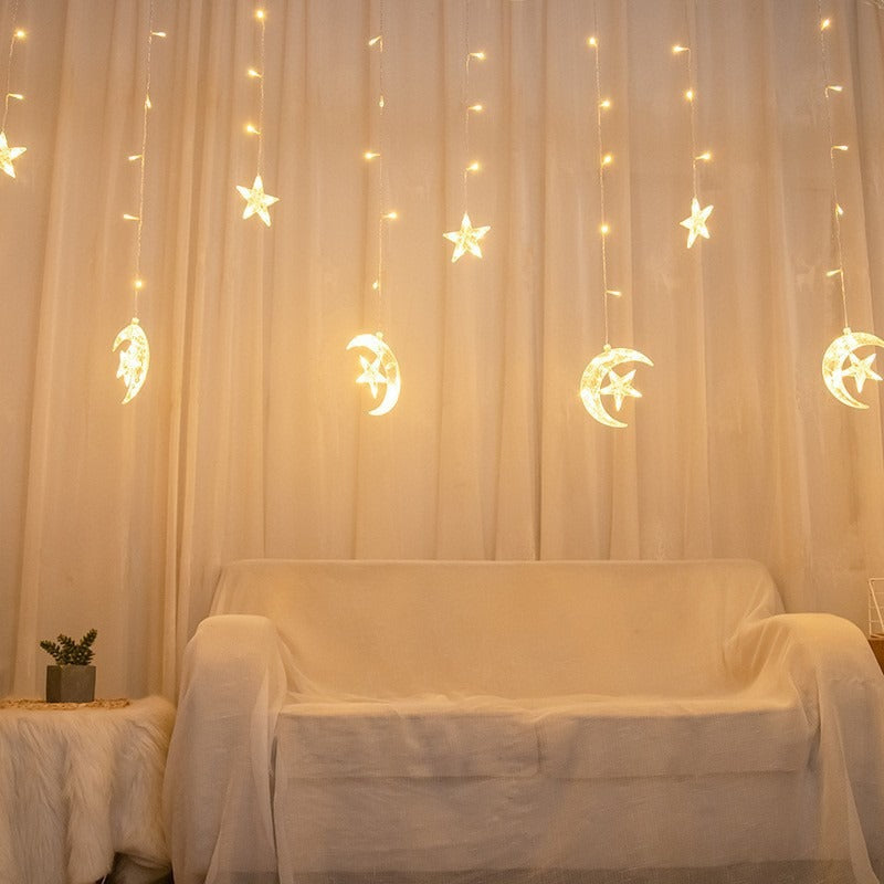 Hanging star and crescent moon LED curtain string lights for bedroom ambiance