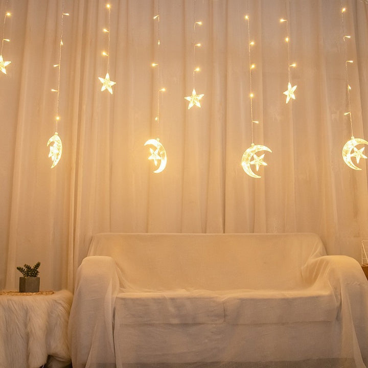 Hanging star and crescent moon LED curtain string lights for bedroom ambiance