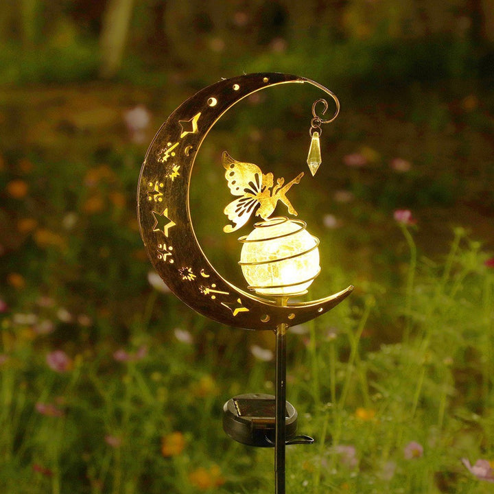 Solar-powered decorative garden stake light with crescent moon fairy lantern