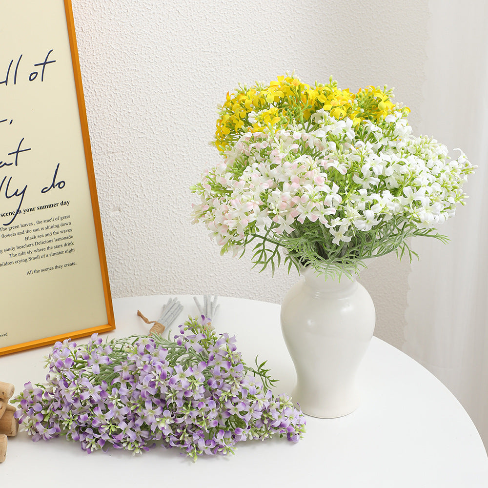 Decorative artificial flower arrangement