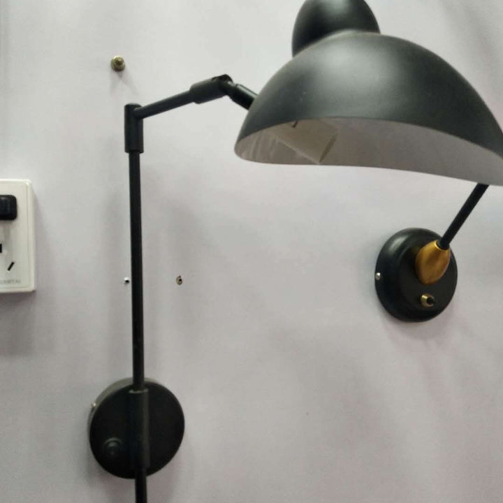 Articulated wall lamp with curved arm and adjustable bell shade