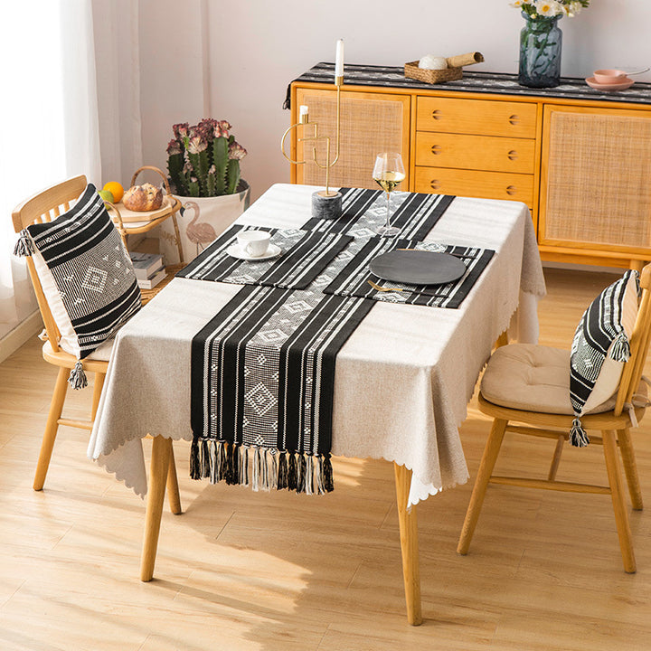 Handwoven table runner made of cotton blend with fringes and geometric dot jacquard