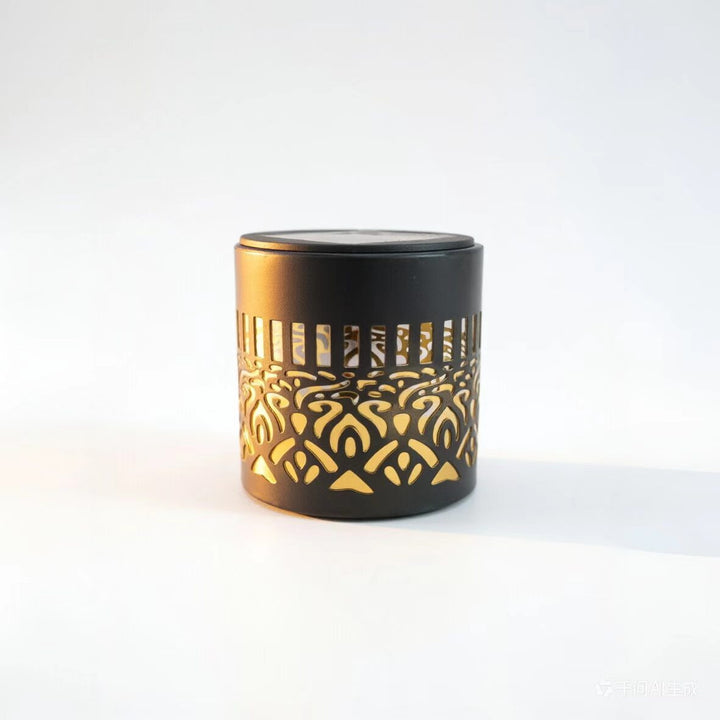 Decorative filigree metal tealight lantern with reflective inner lining