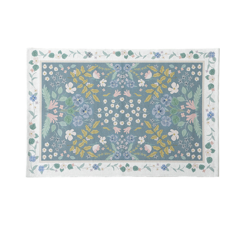 Woven cotton bath mat with floral allover jacquard pattern
