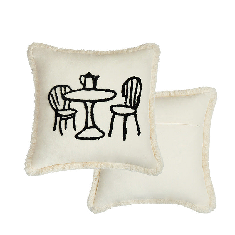 Decorative pillowcase with embroidered café motif, fringed edge, and concealed zipper