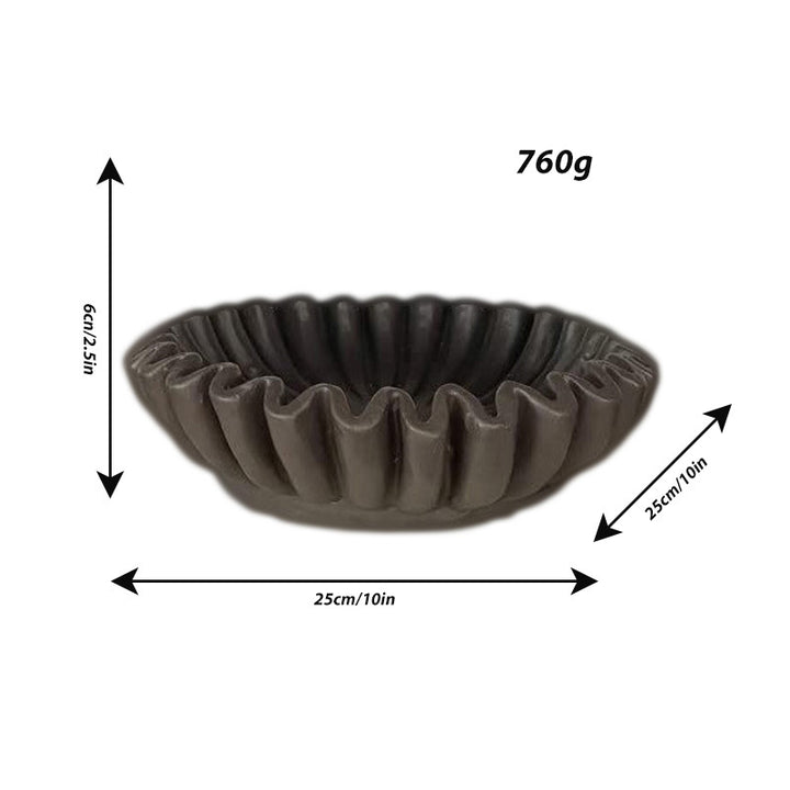 Decorative serving bowl with wave design