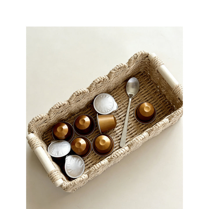 Decorative storage basket with ergonomic handles