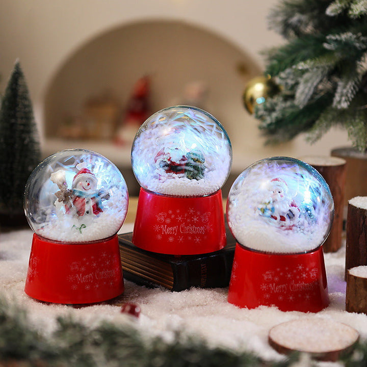 Snow globe with Santa Claus and Christmas tree