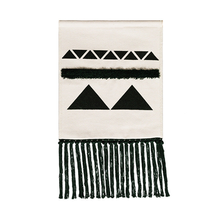 Hand-woven wall hanging and table runner made of cotton blend with geometric staircase pattern and long fringes