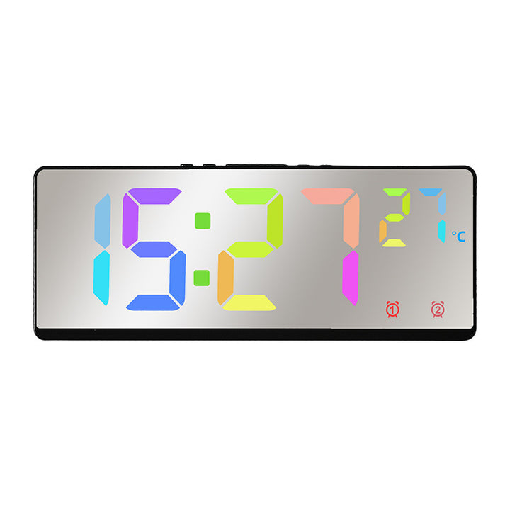 Digital alarm clock with mirror display and temperature function