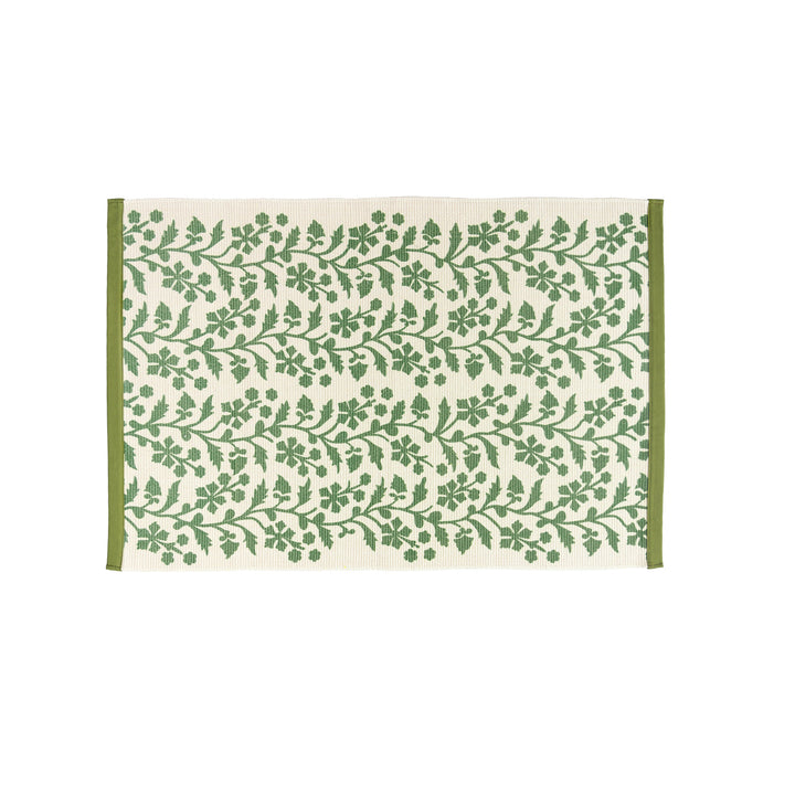 Woven table runner with floral vinyl print look and reinforced overlock stitching