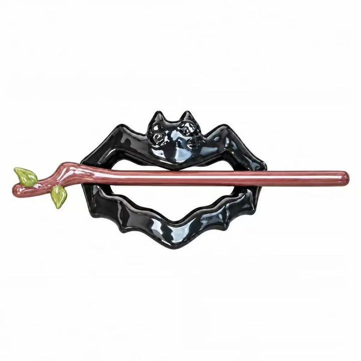 Decorative chopstick holder in bat design