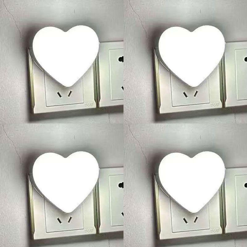 Heart-shaped plug-in ambient night light with soft LED lighting