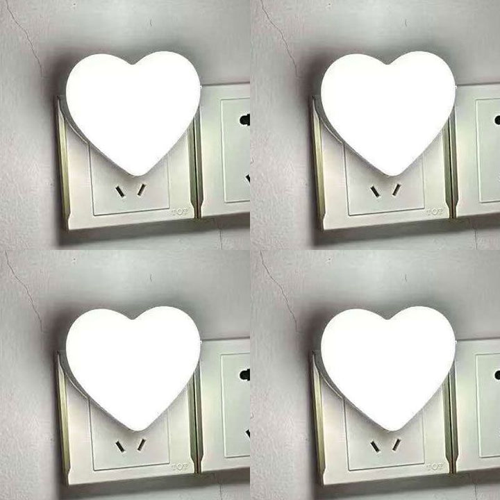 Heart-shaped plug-in ambient night light with soft LED lighting