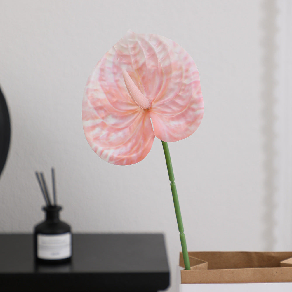 Elegant artificial orchid with delicate flowers