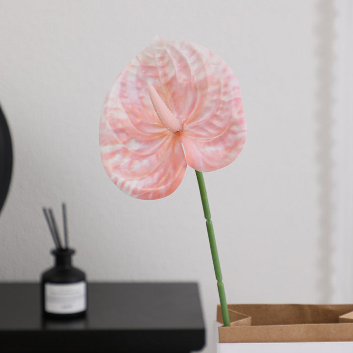 Elegant artificial orchid with delicate flowers